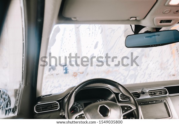 Auto\
detailing of car interior on carwash\
service