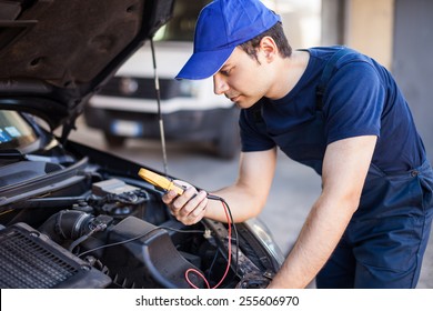 Auto Electrician Troubleshooting A Car Engine