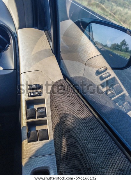 Auto Glass control\
console in the sunset.