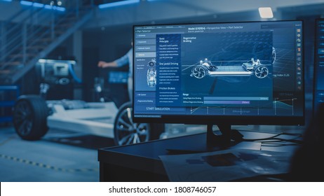 Auto Industry Design Facility Screens Show 3D Cad Software: Electric Vehicle Platform Chassis Prototype And Concept With Wheels, Engine And Battery. Engineers And Developers Application