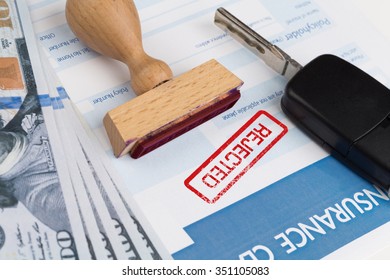 auto insurance claim form with dollar and car key - Shutterstock ID 351105083