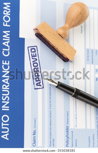 auto insurance\
claim form with stamp\
approved