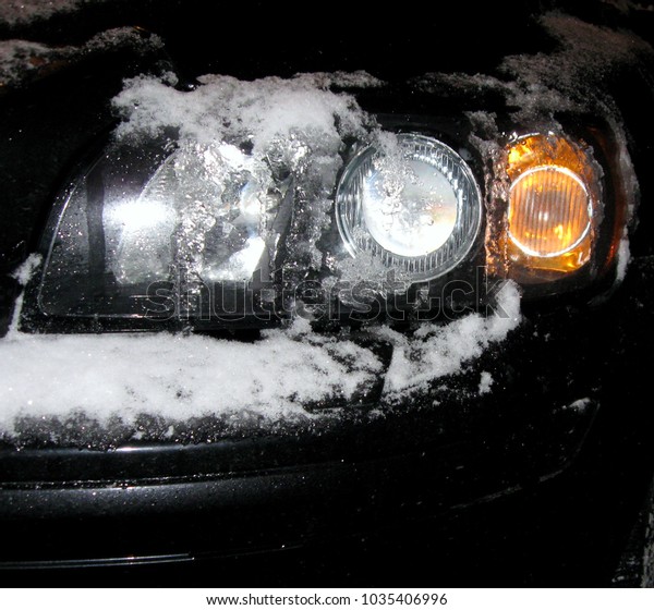 Auto light\
after driving in cold and snowy\
weather