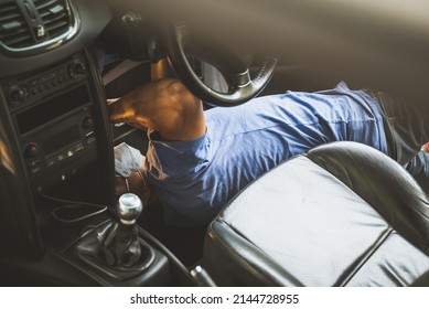 Auto mechanic adjusting the clutch pedal height ,hydraulic clutch pedal adjustment. - Shutterstock ID 2144728955