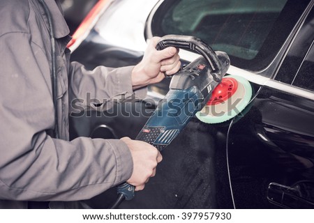 auto mechanic buffing car autobody 