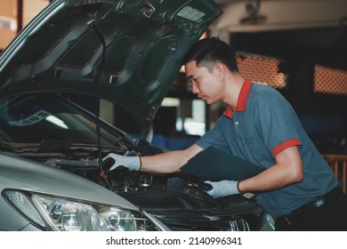 Auto Mechanic, Car Repair Service Center, Young Mechanic Checking Cars, Concept Of A Comprehensive Car Repair Service Center.