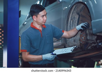 Auto Mechanic, Car Repair Service Center, Young Mechanic Checking Cars, Concept Of A Comprehensive Car Repair Service Center.