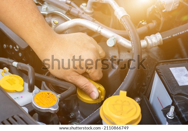 Auto mechanic or driver checks steering and gear\
system and start system before driving at service station,change\
and repair before drive \
