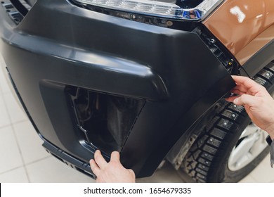 Auto Mechanic Repair Car Body Bumper Replacement.