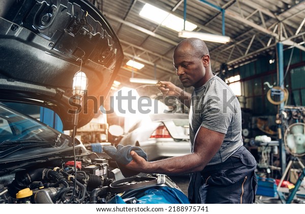 Auto mechanic are repair and maintenance\
auto engine is problems at car repair\
shop.