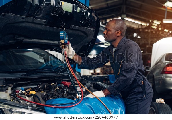 Auto mechanic are repair and maintenance\
auto engine is problems at car repair\
shop.