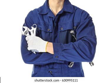 Auto mechanic with tools on white background, closeup - Powered by Shutterstock