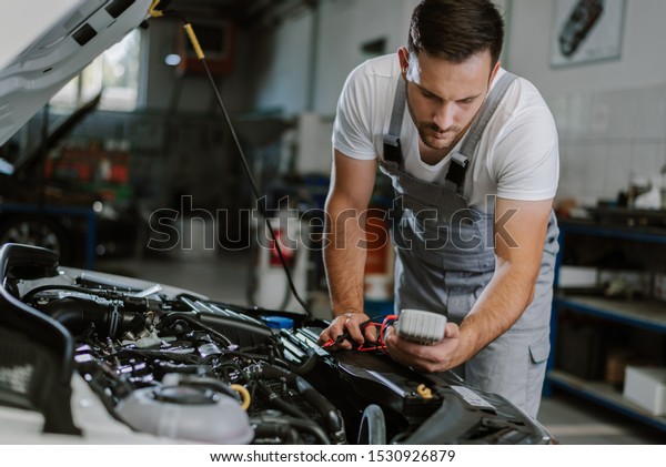 Auto Mechanic Working On Car Diagnostic Stock Photo (Edit Now) 1530926879