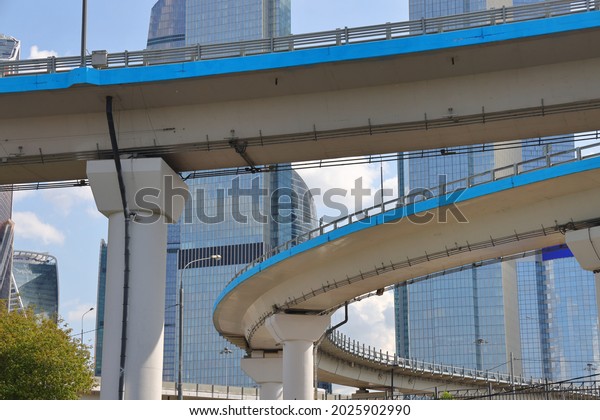 Auto overpasses against the background\
of high rise buildings of Moscow City, August,\
2021