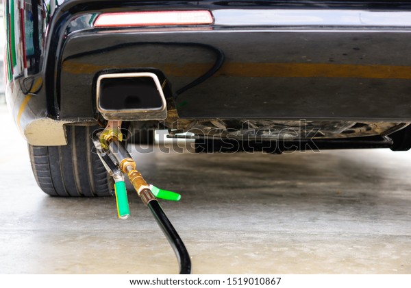 Auto refueling with energy LPG gas to\
car at Filling LPG station petroleum gas\
pump