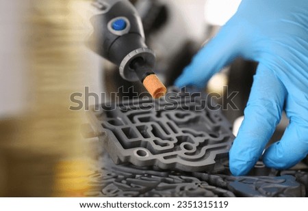The auto repair service repairman in automatic