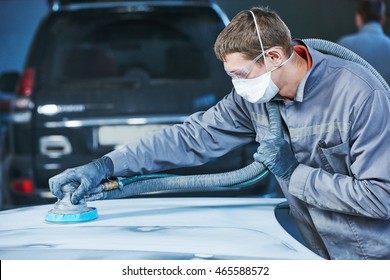 Auto Repairman Grinding Autobody Bonnet