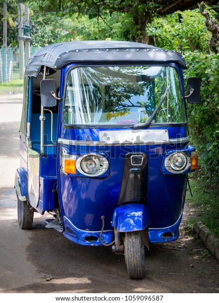 An auto rickshaw is a\
motorized development of the traditional pulled rickshaw or cycle\
rickshaw