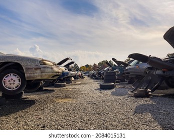 Auto Scrap Junkyard. Recycling Of Wrecked Automobile Used Car Parts.