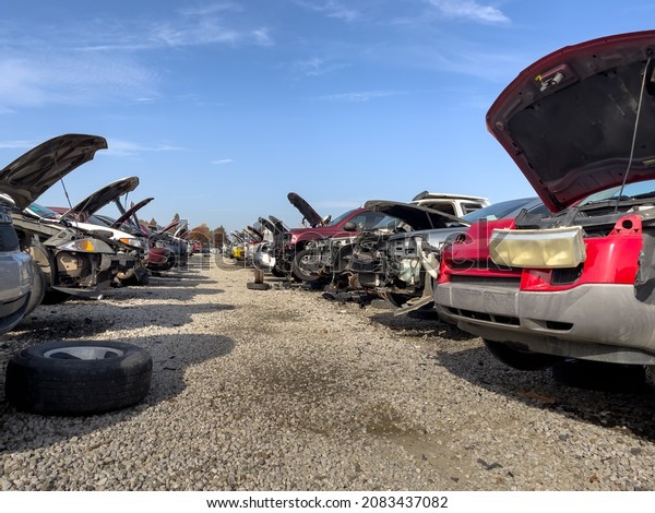 Auto scrap junkyard. Recycling of wrecked\
automobile used car parts.