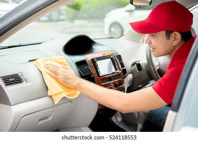 Auto Service Staff Cleaning Car Interior - Car Detailing And Valeting Concept