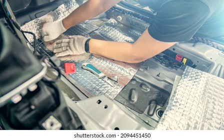 Auto Service Worker Installs Soundproofing Material Inside Car Interior, Soundproofing Insulation