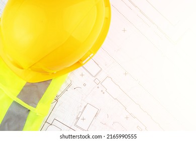 autocad drawing, Architecture and construction, builder's hard hat and safety vest on architectural blueprints