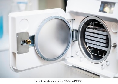 Autoclave In Dentist Office. Dental Infection Control And Sterilization