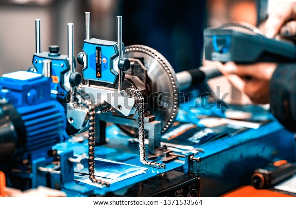 Automated Assembly line of
mechanical engineering. Shallow depth of field. The background is
blurred.