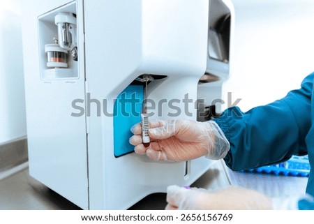 Automated Blood Sample Processing in Hematology Analyzer by Gloved Technician