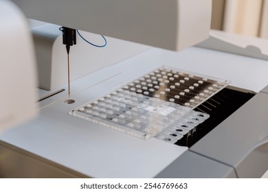 Automated laboratory pipetting system for precise liquid handling and sample preparation - Powered by Shutterstock