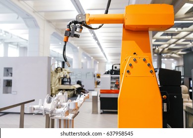 Automated robotic arm for welding on modern equipment factories