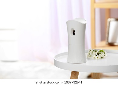 Automatic Air Freshener On Table In Room