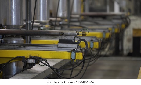 Automatic Aluminium extrusion production line factory. Production of Complex lightweight extruded aluminium metal profiles, commonly used as material in construction and manufacturing