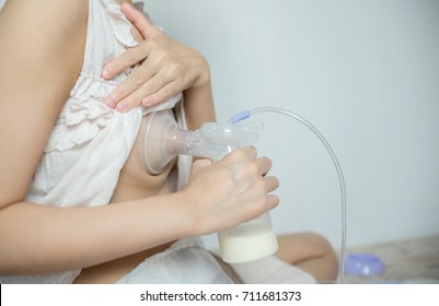 Automatic breast pump, Asia mothers breasts milk for baby