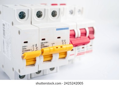 Automatic circuit breaker on white background, control and protect electrical power system.