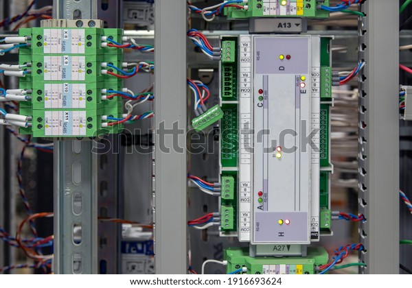 Automatic control systems close-up. Components and
Controls for Process Control and Industrial Automation Solutions
Fiber Optic Networking Equipment. Production automation. Long
distance data and
comm