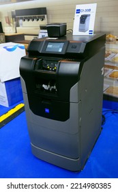 Automatic Deposit Machine Glory Placed On A Stand. Exhibition Retail Industry-2021. March 16, 2021. Berezovka, Ukraine