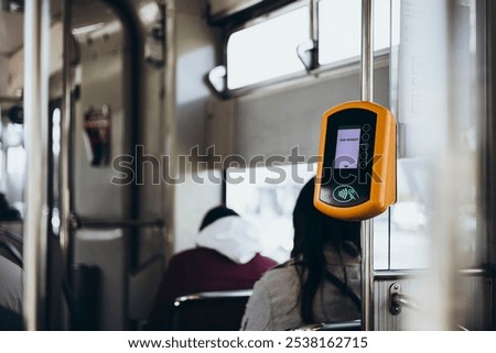 Automatic device for reading and scanning of public transport cards and bank cards to pay for riding in public transport. Validator in tram. Pay for your ride. Copy space.
