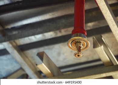 Automatic Fire ceiling Sprinkler in red water pipe System - Shutterstock ID 649191430