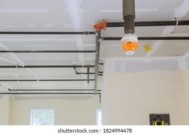 Automatic Fire Sprinkler System Install On Pipe Ceiling Background In Office Building