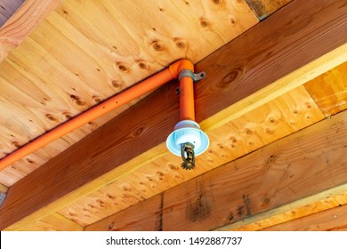 Automatic Fire Sprinkler System In Wood Framed Building During Installation, Construction Or Maintenance 