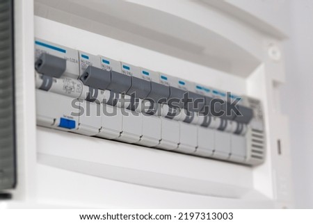 Automatic fuse electrical connector in power lines located inside of switch control panel board - close up view