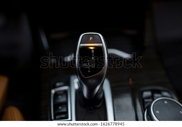 automatic gear stick of a modern car, car
interior details