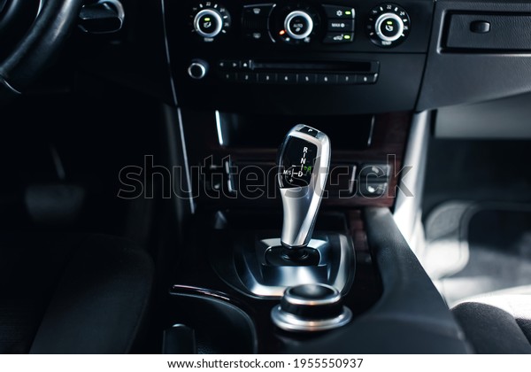Automatic gear stick of a modern car. Modern car\
interior details.