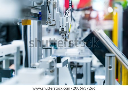 automatic gripping and smart robot working on smart factory,industry 4.0 and technology.