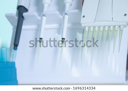 Automatic high throughput histology staining device and automatic pipettes. Medical test lab. Tools for laboratory analysis of samples for novel coronavirus, cancer, viral, pathologies.
