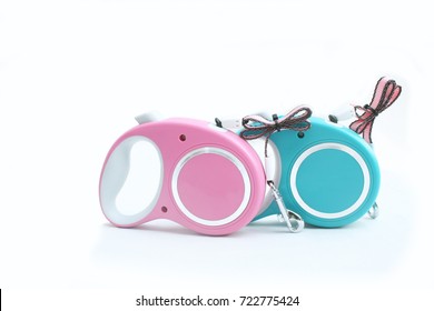 Automatic leash for pet or animal on isolated white. Leashes for pets walking outside to control.