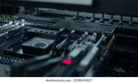 Automatic machine for assembling and installing SMD components. Industrial production of electronics and circuit board. Manufacture of electronic chips. High-tech, cthe fourth industrial revolution.