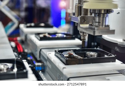 Automatic machinery for assembling and inspecting hard disk drives in the production line	